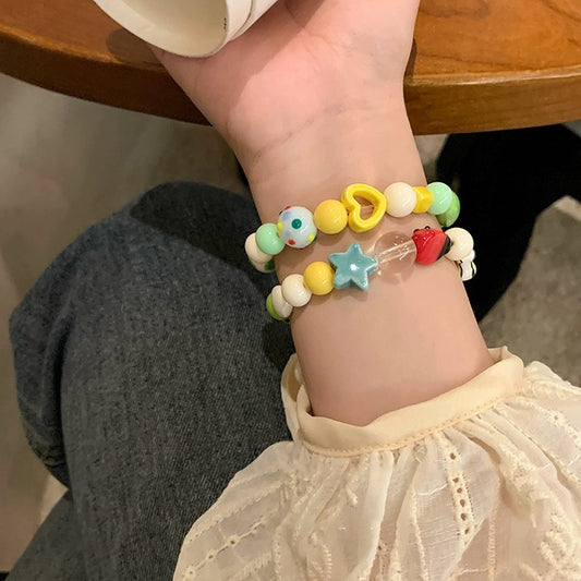 Mignon bracelet de perles LADYBIRD couleur féminine